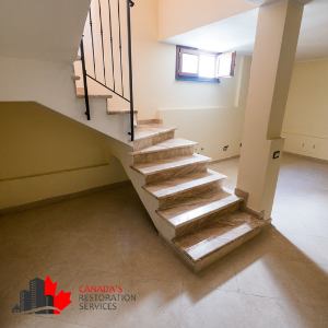 empty basement window open and stairs for mold removal in edmonton