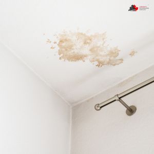 Water stain on ceiling from a leak in a home in Burlington